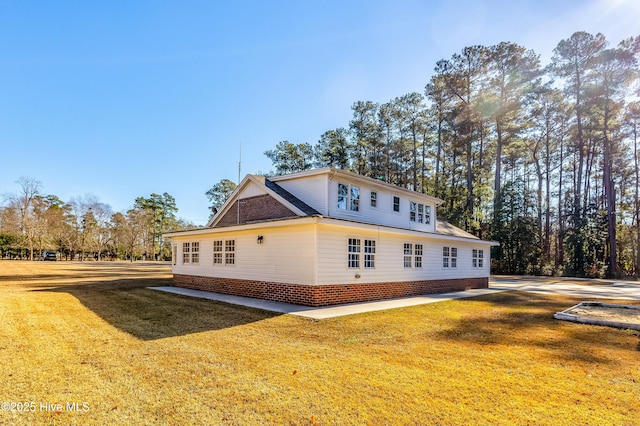 view of property exterior featuring a yard