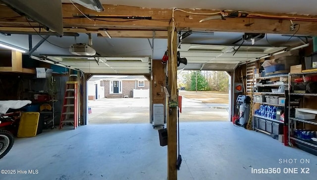 garage featuring a garage door opener