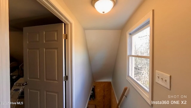 hall with dark hardwood / wood-style flooring