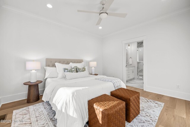 bedroom featuring ornamental molding, light wood-type flooring, and ceiling fan