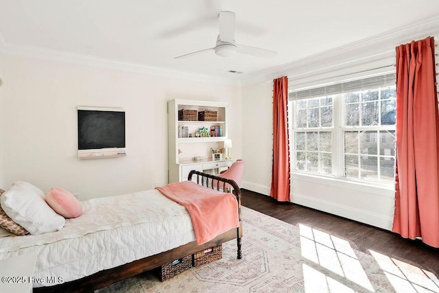 bedroom featuring ceiling fan, hardwood / wood-style floors, and ornamental molding