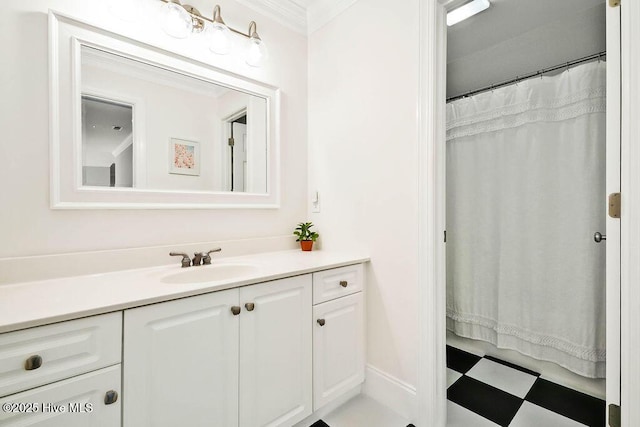 bathroom with vanity and crown molding