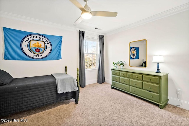 bedroom with ceiling fan, light carpet, and ornamental molding