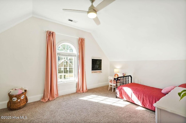 carpeted bedroom featuring ceiling fan and vaulted ceiling