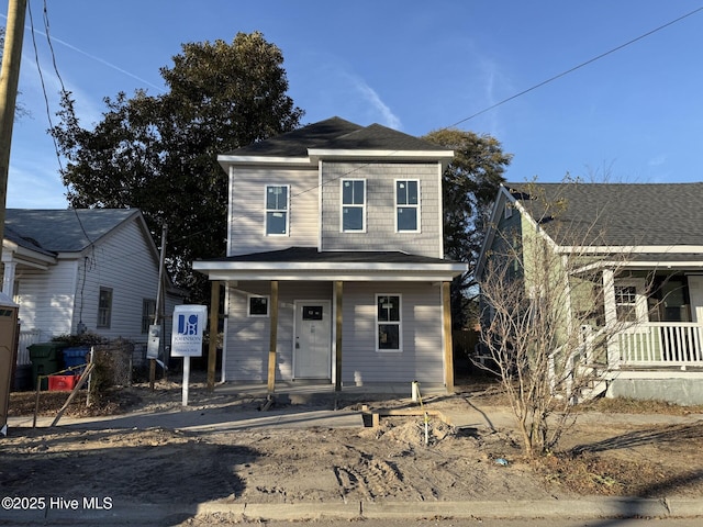 view of property with a porch