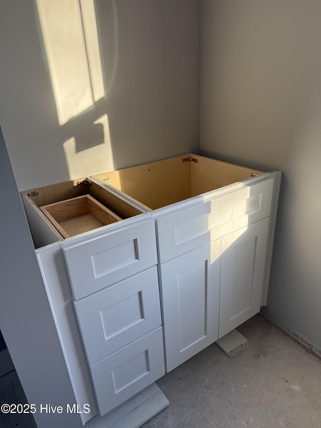 bathroom with concrete flooring