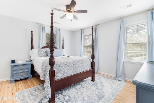 bedroom featuring light wood-type flooring and ceiling fan