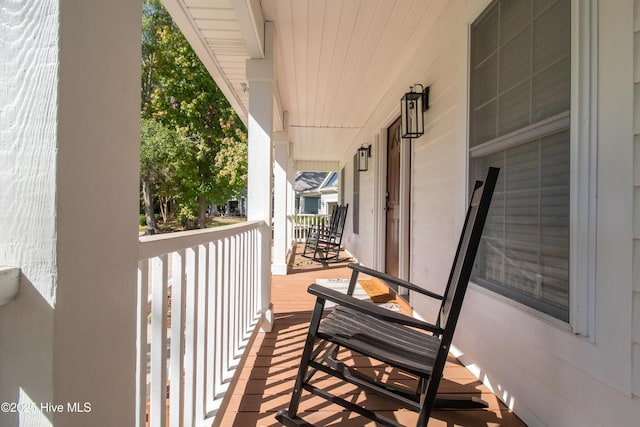 balcony featuring a porch