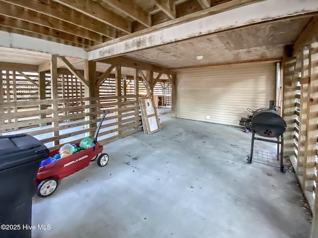 misc room with concrete flooring