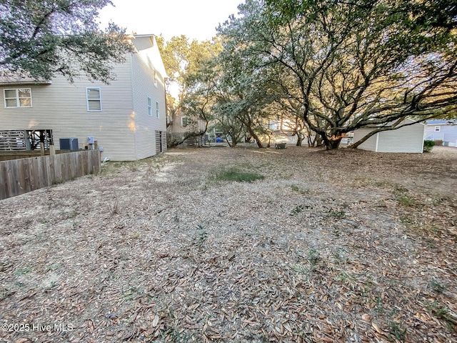 view of yard featuring central AC unit