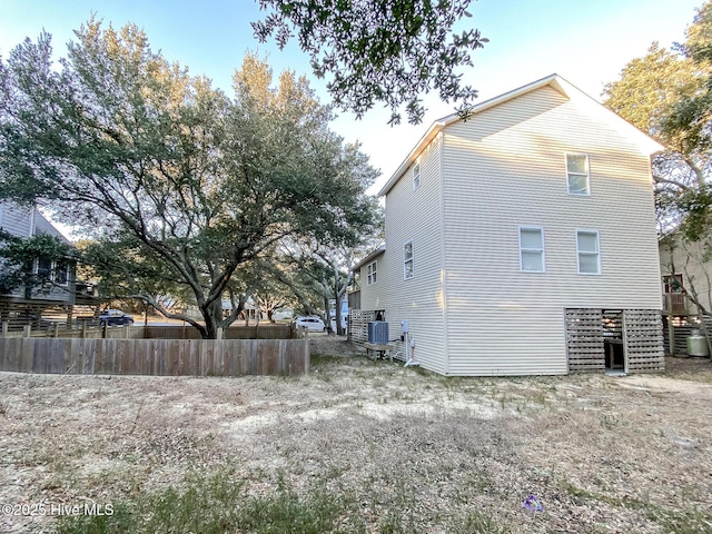 view of home's exterior with central AC