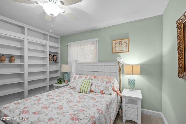 bedroom with ceiling fan and carpet flooring