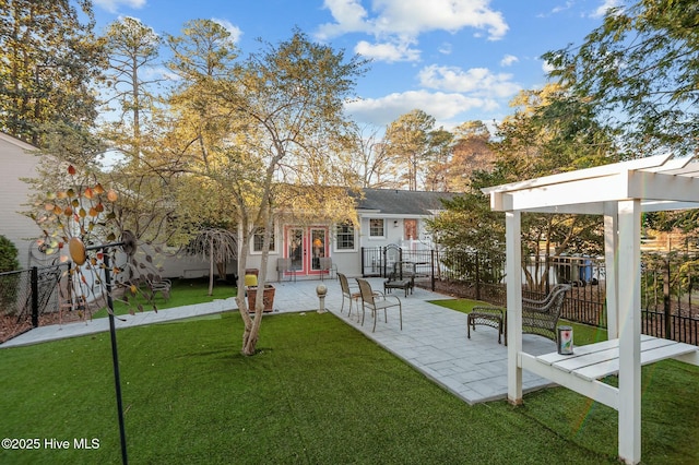 exterior space featuring a patio and a lawn