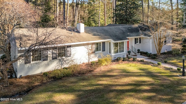 exterior space featuring a front yard