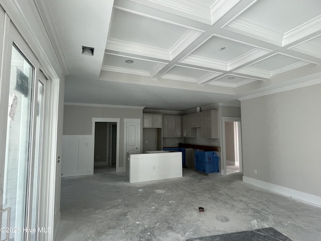 kitchen with beam ceiling, coffered ceiling, and ornamental molding