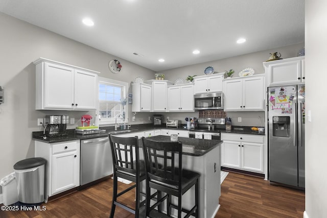 kitchen featuring white cabinets and stainless steel appliances