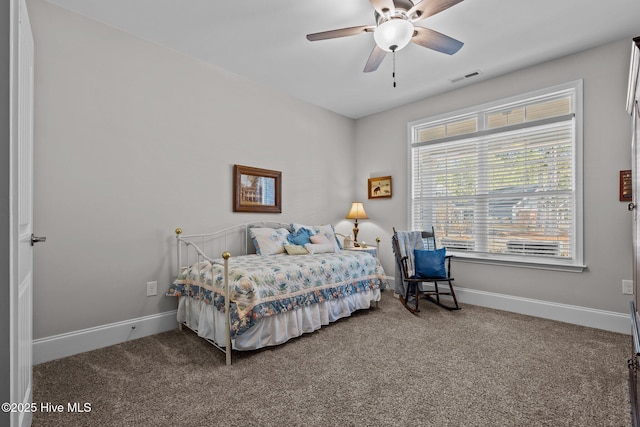 bedroom featuring ceiling fan and carpet floors