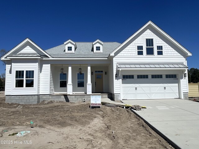 unfinished property featuring a garage