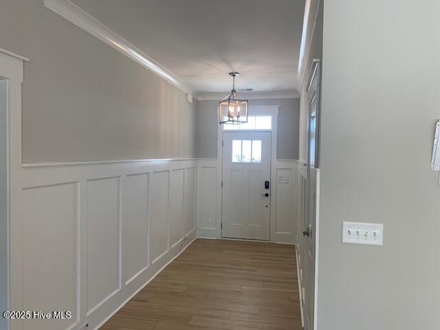 spare room with a raised ceiling