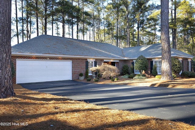 single story home with a garage