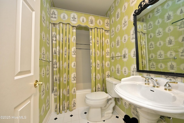 full bathroom with toilet, tile patterned flooring, shower / bath combo, and sink