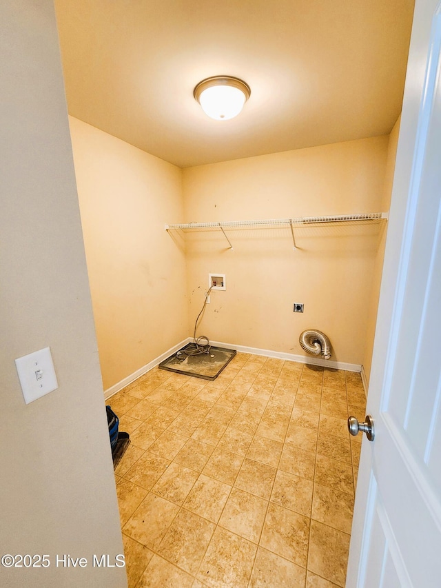 clothes washing area featuring hookup for a washing machine