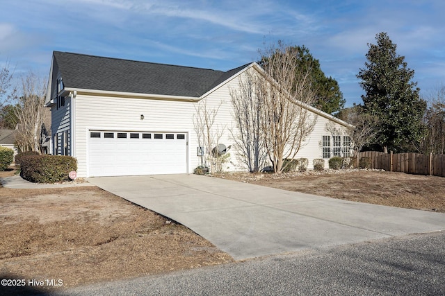 view of property exterior with a garage