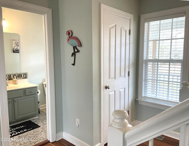 hall featuring dark wood-type flooring