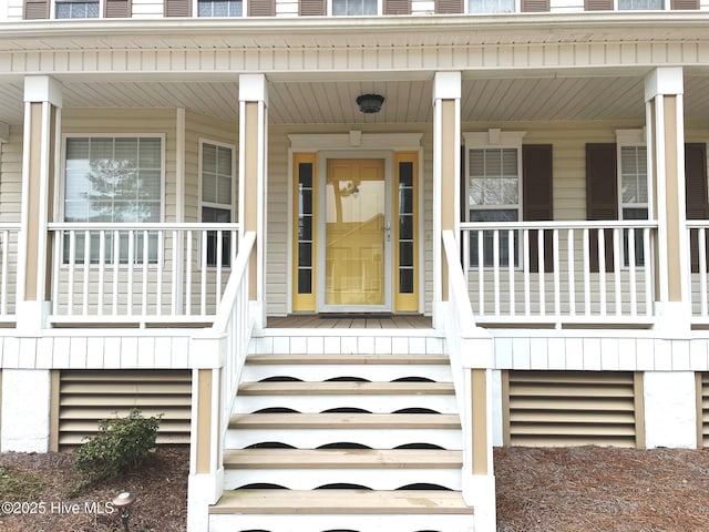 doorway to property with covered porch