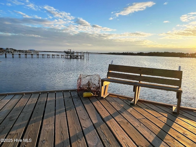 view of dock with a water view