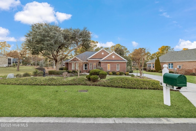 view of front of home featuring a front yard