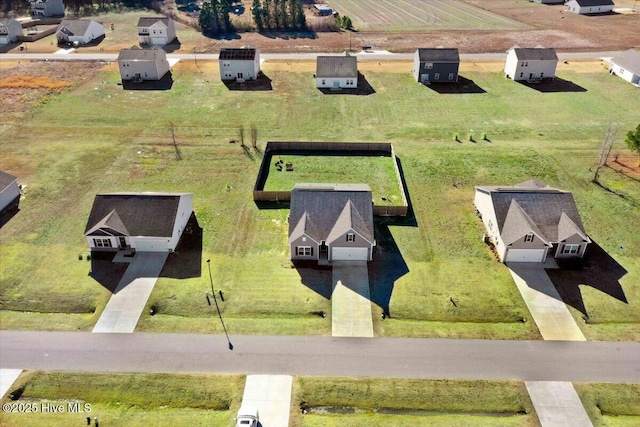 bird's eye view with a rural view