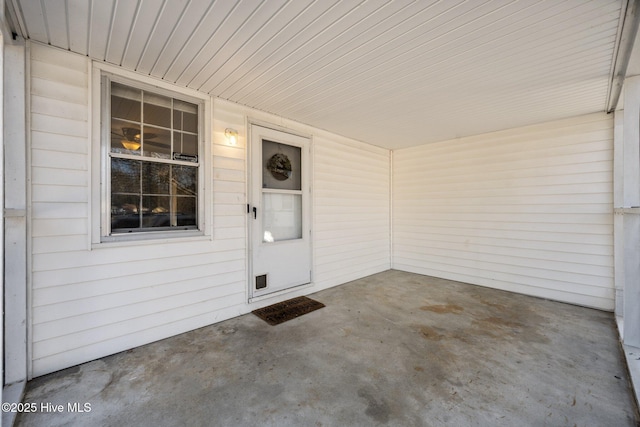 entrance to property with a patio