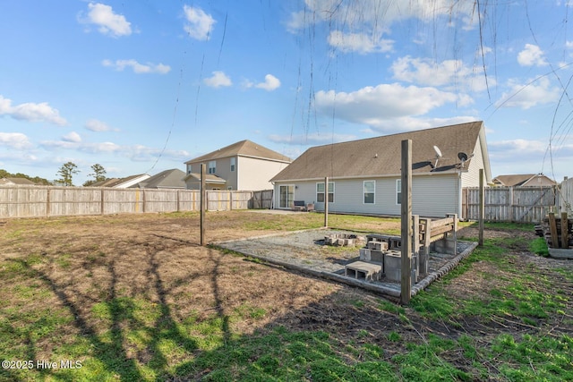 rear view of property with a yard