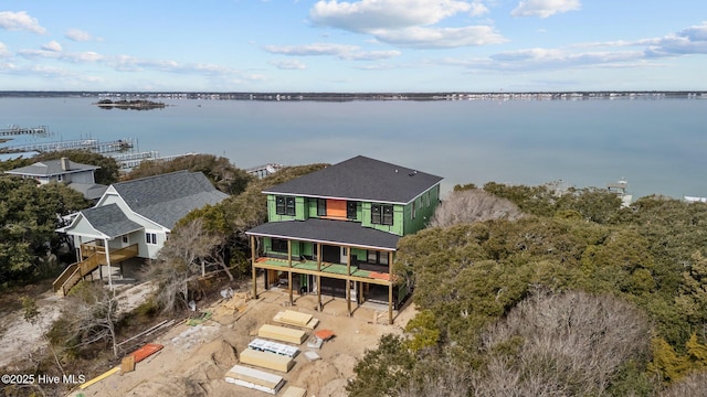 bird's eye view with a water view