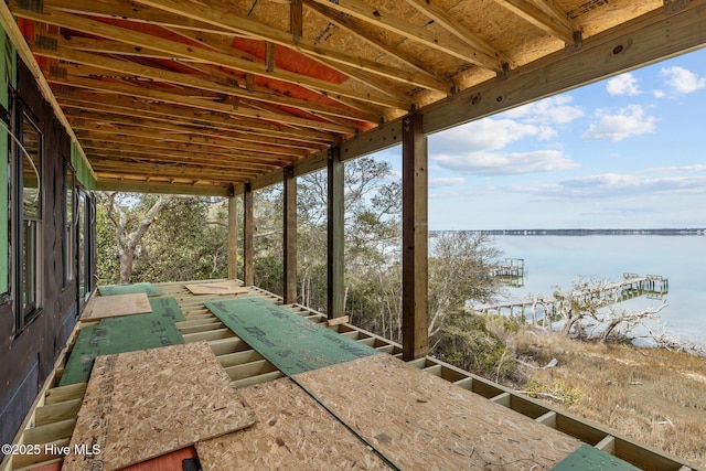 view of patio with a water view