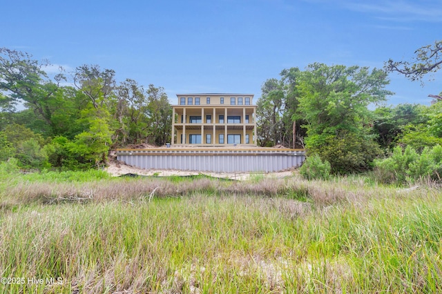 3804 Emerald Dr E, Emerald Isle, NC 28594 - rear view of house with a balcony