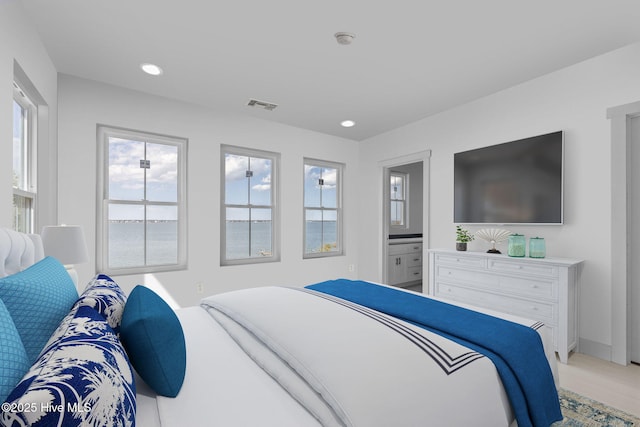 3804 Emerald Dr E, Emerald Isle, NC 28594 - bedroom with recessed lighting, baseboards, visible vents, and light wood-style flooring