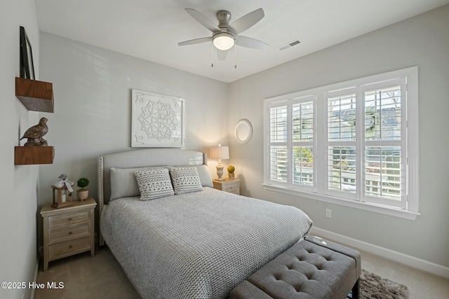 carpeted bedroom featuring ceiling fan