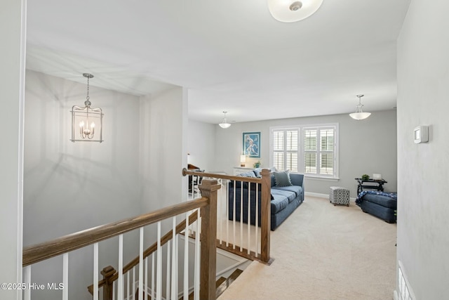 hallway with carpet flooring