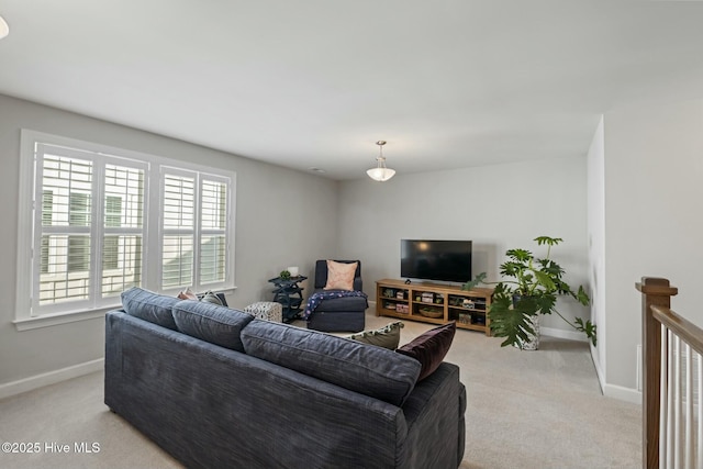 living room with light colored carpet