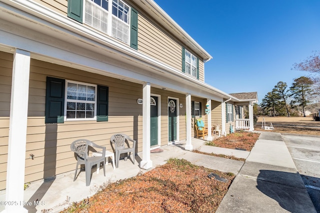 exterior space featuring covered porch