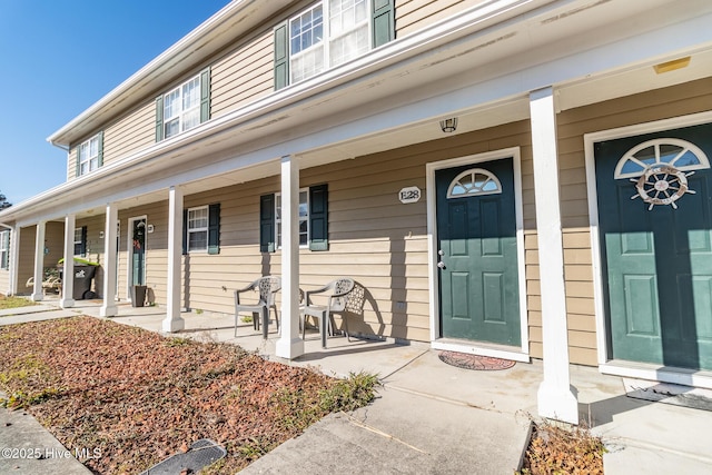 entrance to property with a porch