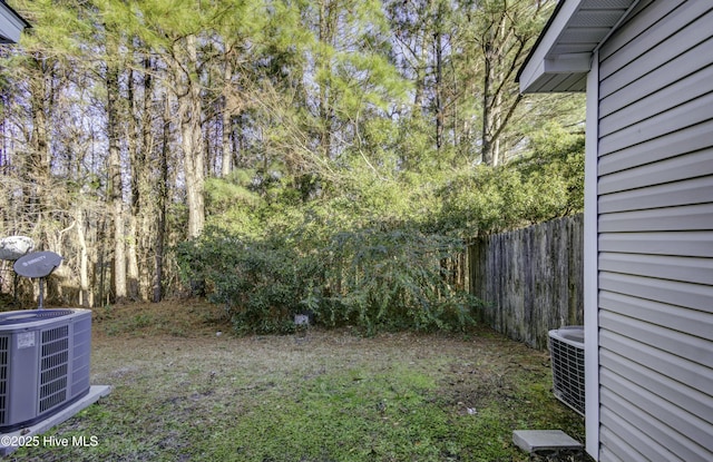 view of yard with central AC