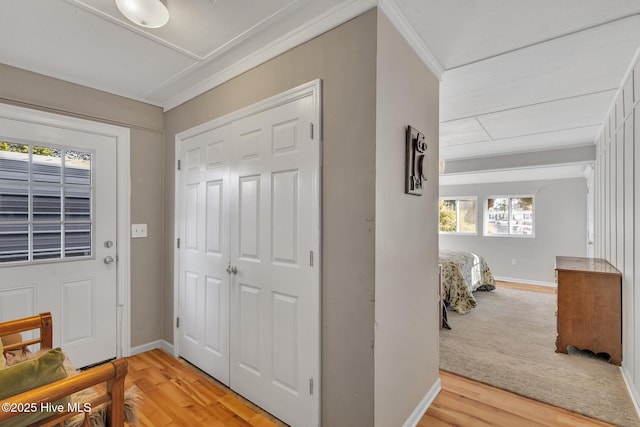 1126 Ccc Rd, Sneads Ferry, NC 28460 - entrance foyer with ornamental molding and hardwood / wood-style floors