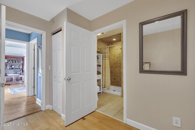 1126 Ccc Rd, Sneads Ferry, NC 28460 - corridor with wood-type flooring