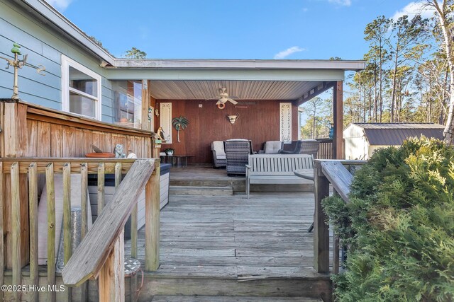 1126 Ccc Rd, Sneads Ferry, NC 28460 - wooden terrace with ceiling fan