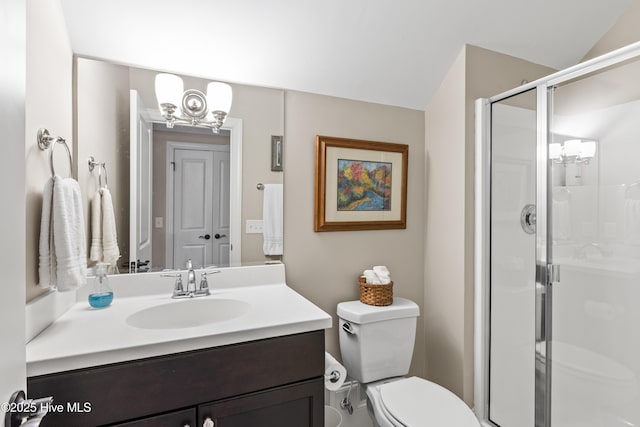 bathroom with toilet, walk in shower, lofted ceiling, an inviting chandelier, and vanity