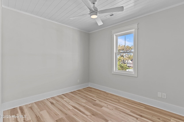 empty room featuring ceiling fan, crown molding, and light hardwood / wood-style floors