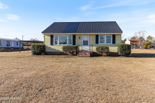 view of front facade with a front yard